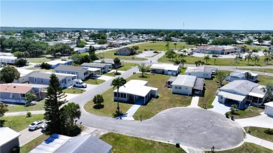 2 bed/2 bath in a cul-de-sac, long driveway w/space for vehicles on Barefoot Bay Golf Course in Florida - for sale on GolfHomes.com, golf home, golf lot