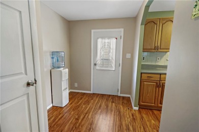 2 bed/2 bath in a cul-de-sac, long driveway w/space for vehicles on Barefoot Bay Golf Course in Florida - for sale on GolfHomes.com, golf home, golf lot