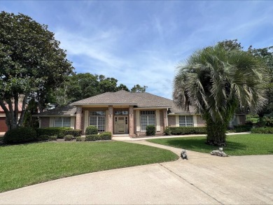 This stunning custom-built, all-brick home is ideally located on on Sawgrass Country Club  in Florida - for sale on GolfHomes.com, golf home, golf lot