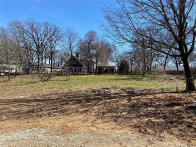 This is a .64 Acre lot with lake view, not a house. Cedar Creek on Cedar Creek Country Club in Texas - for sale on GolfHomes.com, golf home, golf lot