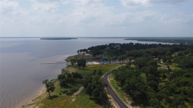 This is a .64 Acre lot with lake view, not a house. Cedar Creek on Cedar Creek Country Club in Texas - for sale on GolfHomes.com, golf home, golf lot