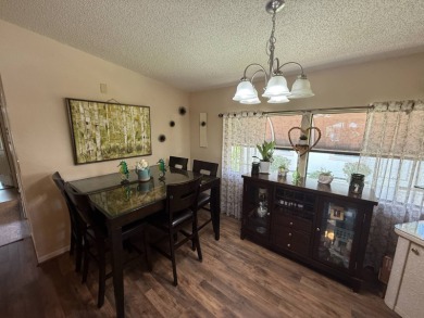 This well-cared for Palm Harbor home is being sold fully on Del Tura Golf and Country Club in Florida - for sale on GolfHomes.com, golf home, golf lot
