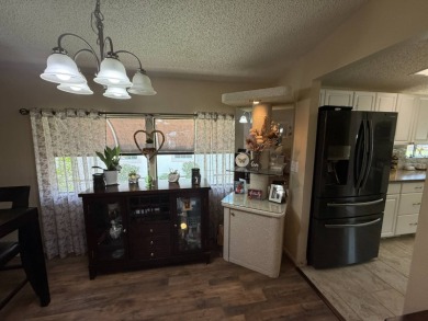 This well-cared for Palm Harbor home is being sold fully on Del Tura Golf and Country Club in Florida - for sale on GolfHomes.com, golf home, golf lot