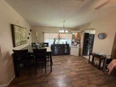 This well-cared for Palm Harbor home is being sold fully on Del Tura Golf and Country Club in Florida - for sale on GolfHomes.com, golf home, golf lot
