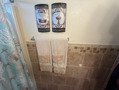 This well-cared for Palm Harbor home is being sold fully on Del Tura Golf and Country Club in Florida - for sale on GolfHomes.com, golf home, golf lot