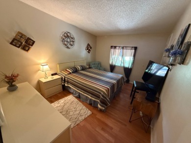 This well-cared for Palm Harbor home is being sold fully on Del Tura Golf and Country Club in Florida - for sale on GolfHomes.com, golf home, golf lot