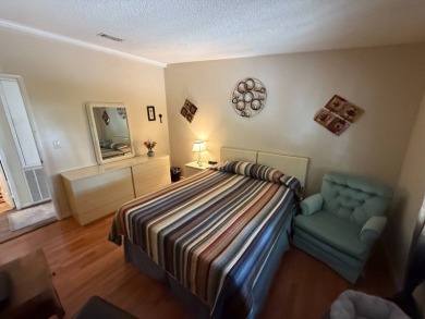 This well-cared for Palm Harbor home is being sold fully on Del Tura Golf and Country Club in Florida - for sale on GolfHomes.com, golf home, golf lot