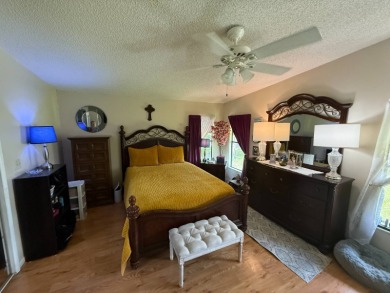 This well-cared for Palm Harbor home is being sold fully on Del Tura Golf and Country Club in Florida - for sale on GolfHomes.com, golf home, golf lot