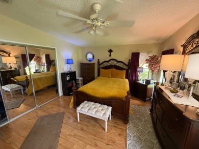 This well-cared for Palm Harbor home is being sold fully on Del Tura Golf and Country Club in Florida - for sale on GolfHomes.com, golf home, golf lot