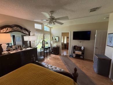 This well-cared for Palm Harbor home is being sold fully on Del Tura Golf and Country Club in Florida - for sale on GolfHomes.com, golf home, golf lot