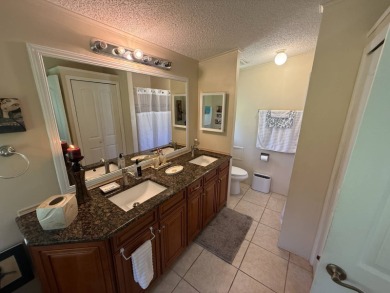 This well-cared for Palm Harbor home is being sold fully on Del Tura Golf and Country Club in Florida - for sale on GolfHomes.com, golf home, golf lot