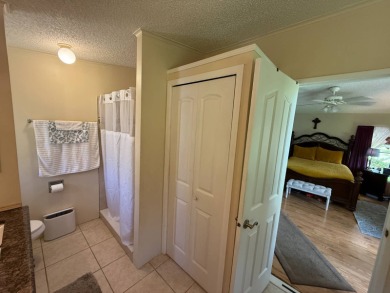 This well-cared for Palm Harbor home is being sold fully on Del Tura Golf and Country Club in Florida - for sale on GolfHomes.com, golf home, golf lot