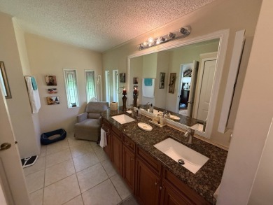 This well-cared for Palm Harbor home is being sold fully on Del Tura Golf and Country Club in Florida - for sale on GolfHomes.com, golf home, golf lot