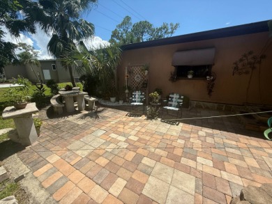 This well-cared for Palm Harbor home is being sold fully on Del Tura Golf and Country Club in Florida - for sale on GolfHomes.com, golf home, golf lot