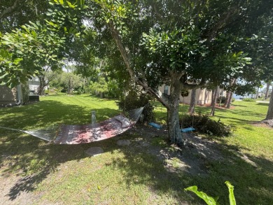 This well-cared for Palm Harbor home is being sold fully on Del Tura Golf and Country Club in Florida - for sale on GolfHomes.com, golf home, golf lot