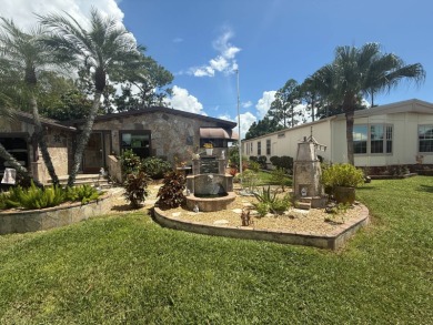 This well-cared for Palm Harbor home is being sold fully on Del Tura Golf and Country Club in Florida - for sale on GolfHomes.com, golf home, golf lot