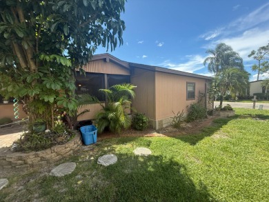 This well-cared for Palm Harbor home is being sold fully on Del Tura Golf and Country Club in Florida - for sale on GolfHomes.com, golf home, golf lot