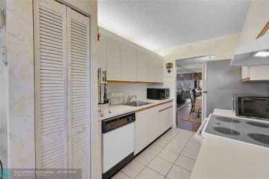Oversized 2/2 on 4th Floor in Century Village a 55+ Community on Flamingo Lakes Country Club in Florida - for sale on GolfHomes.com, golf home, golf lot