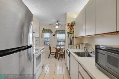 Oversized 2/2 on 4th Floor in Century Village a 55+ Community on Flamingo Lakes Country Club in Florida - for sale on GolfHomes.com, golf home, golf lot