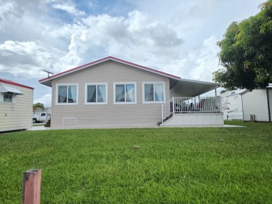 Blue Cypress - 2/2 Updated well-maintained home and spacious on Blue Cypress Golf and RV Resort in Florida - for sale on GolfHomes.com, golf home, golf lot