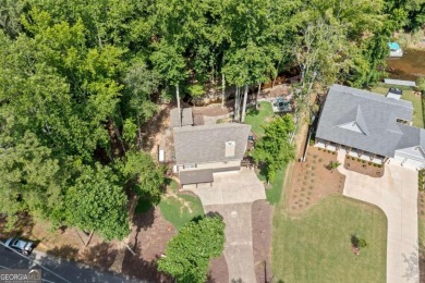 Lake Access and Private Dock! This Charming Lakeside Retreat is on The Highlands Course at Lake Arrowhead in Georgia - for sale on GolfHomes.com, golf home, golf lot