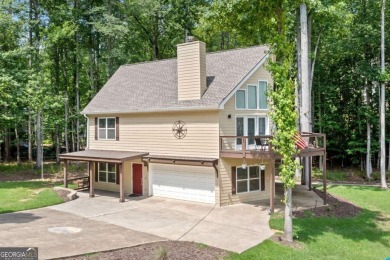 Lake Access and Private Dock! This Charming Lakeside Retreat is on The Highlands Course at Lake Arrowhead in Georgia - for sale on GolfHomes.com, golf home, golf lot