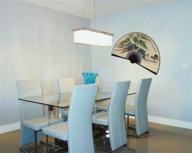 Beautifully updated top-floor 2/2 condo on Palm Aire's Oaks Lane on Palm-Aire Country Club and Resort - Palms in Florida - for sale on GolfHomes.com, golf home, golf lot