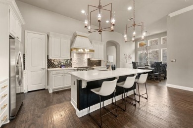 Welcome to this pristine one-story Standard Pacific home located on Trophy Club of Dallas in Texas - for sale on GolfHomes.com, golf home, golf lot