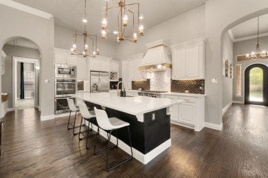 Welcome to this pristine one-story Standard Pacific home located on Trophy Club of Dallas in Texas - for sale on GolfHomes.com, golf home, golf lot