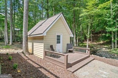 Lake Access and Private Dock! This Charming Lakeside Retreat is on The Highlands Course at Lake Arrowhead in Georgia - for sale on GolfHomes.com, golf home, golf lot