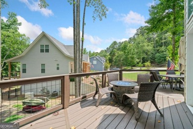 Lake Access and Private Dock! This Charming Lakeside Retreat is on The Highlands Course at Lake Arrowhead in Georgia - for sale on GolfHomes.com, golf home, golf lot