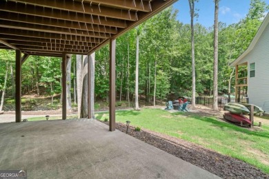 Lake Access and Private Dock! This Charming Lakeside Retreat is on The Highlands Course at Lake Arrowhead in Georgia - for sale on GolfHomes.com, golf home, golf lot