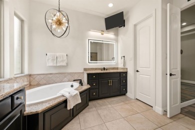 Welcome to this pristine one-story Standard Pacific home located on Trophy Club of Dallas in Texas - for sale on GolfHomes.com, golf home, golf lot