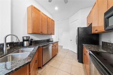 CORNER UNIT -- BEST LOCATION ACROSS FROM POOL + TENNIS COURTS on Oak Harbor Country Club in Florida - for sale on GolfHomes.com, golf home, golf lot