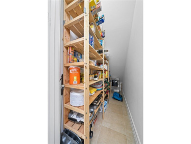 CORNER UNIT -- BEST LOCATION ACROSS FROM POOL + TENNIS COURTS on Oak Harbor Country Club in Florida - for sale on GolfHomes.com, golf home, golf lot