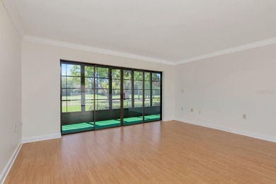 Enjoy the carefree Florida lifestyle in this 2-bedroom, 2-bath on East Lake Woodlands Country Club in Florida - for sale on GolfHomes.com, golf home, golf lot