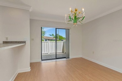 Enjoy the carefree Florida lifestyle in this 2-bedroom, 2-bath on East Lake Woodlands Country Club in Florida - for sale on GolfHomes.com, golf home, golf lot