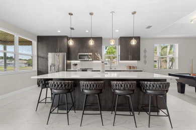 Discover this exceptionally updated single family home situated on Indian Spring Golf and Country Club in Florida - for sale on GolfHomes.com, golf home, golf lot