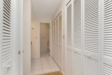 Enjoy the carefree Florida lifestyle in this 2-bedroom, 2-bath on East Lake Woodlands Country Club in Florida - for sale on GolfHomes.com, golf home, golf lot