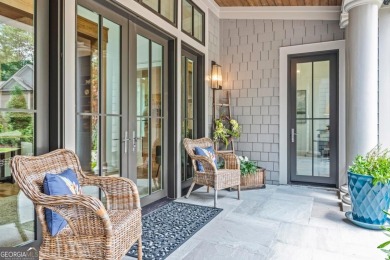 Escape to a private, peaceful lakefront sanctuary in Reynolds on Reynolds Lake Oconee - The Oconee in Georgia - for sale on GolfHomes.com, golf home, golf lot