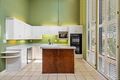 The stunning architecture of this home is likely the Masterpiece on Scenic Hills Country Club in Florida - for sale on GolfHomes.com, golf home, golf lot