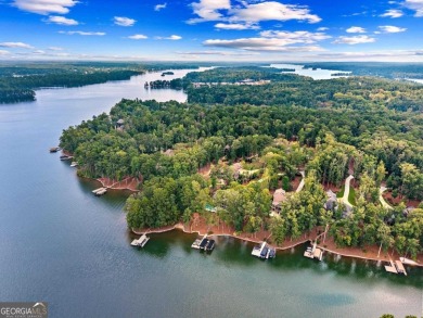 Escape to a private, peaceful lakefront sanctuary in Reynolds on Reynolds Lake Oconee - The Oconee in Georgia - for sale on GolfHomes.com, golf home, golf lot