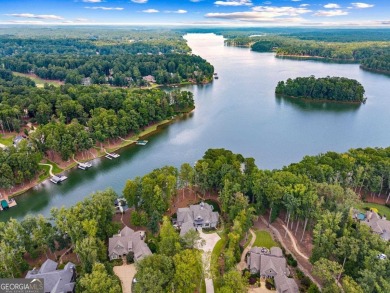 Escape to a private, peaceful lakefront sanctuary in Reynolds on Reynolds Lake Oconee - The Oconee in Georgia - for sale on GolfHomes.com, golf home, golf lot