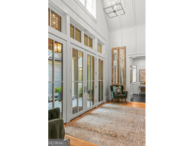 Escape to a private, peaceful lakefront sanctuary in Reynolds on Reynolds Lake Oconee - The Oconee in Georgia - for sale on GolfHomes.com, golf home, golf lot