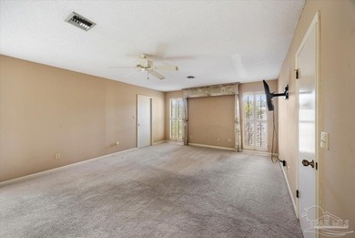 The stunning architecture of this home is likely the Masterpiece on Scenic Hills Country Club in Florida - for sale on GolfHomes.com, golf home, golf lot