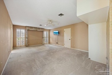 The stunning architecture of this home is likely the Masterpiece on Scenic Hills Country Club in Florida - for sale on GolfHomes.com, golf home, golf lot