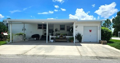 This move in ready, 2-bedroom/2 bath home is situated on a large on Big Cypress Golf and Country Club in Florida - for sale on GolfHomes.com, golf home, golf lot