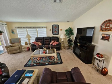 This move in ready, 2-bedroom/2 bath home is situated on a large on Big Cypress Golf and Country Club in Florida - for sale on GolfHomes.com, golf home, golf lot