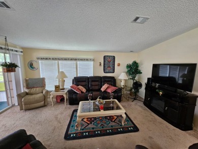 This move in ready, 2-bedroom/2 bath home is situated on a large on Big Cypress Golf and Country Club in Florida - for sale on GolfHomes.com, golf home, golf lot