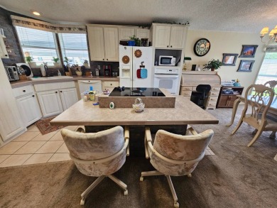 This move in ready, 2-bedroom/2 bath home is situated on a large on Big Cypress Golf and Country Club in Florida - for sale on GolfHomes.com, golf home, golf lot